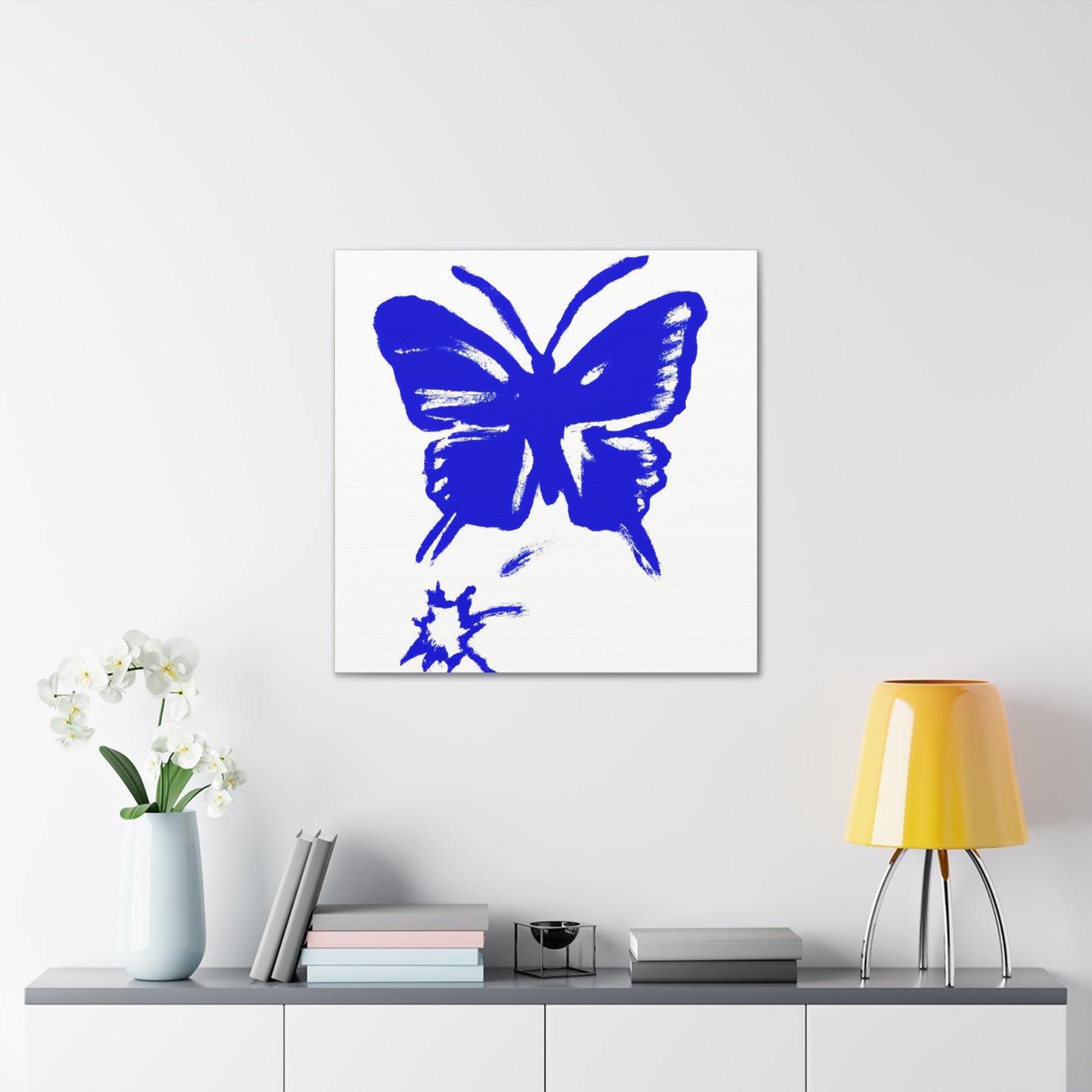 "Blue Butterfly Canvas Print in Banksy Inspired Style - A Creative Wall Art Piece". by PenPencilArt